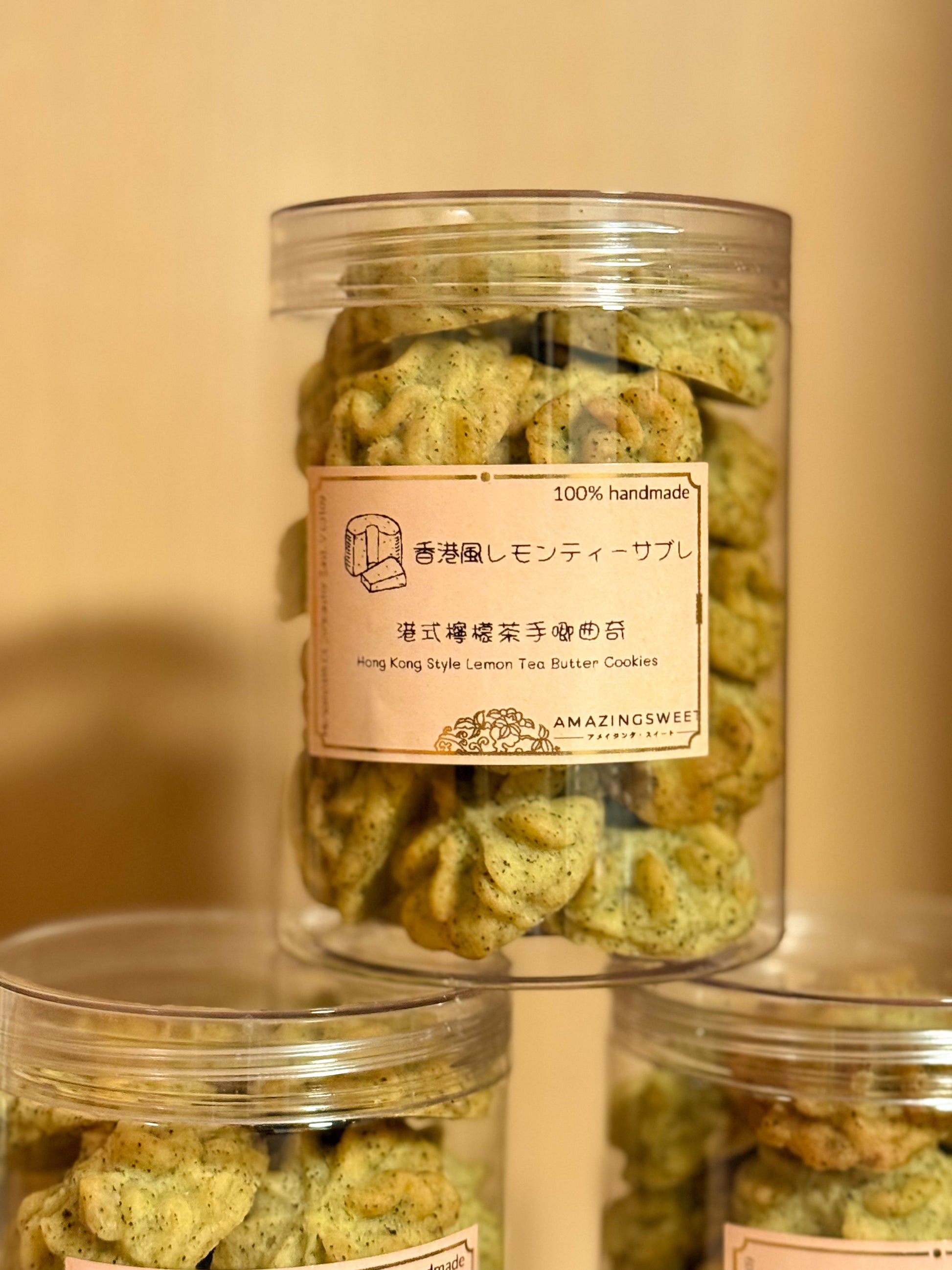 Jar of green cookies with a label on a beige background
