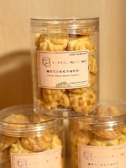 Jar of cheesy cookies with a label on a beige background